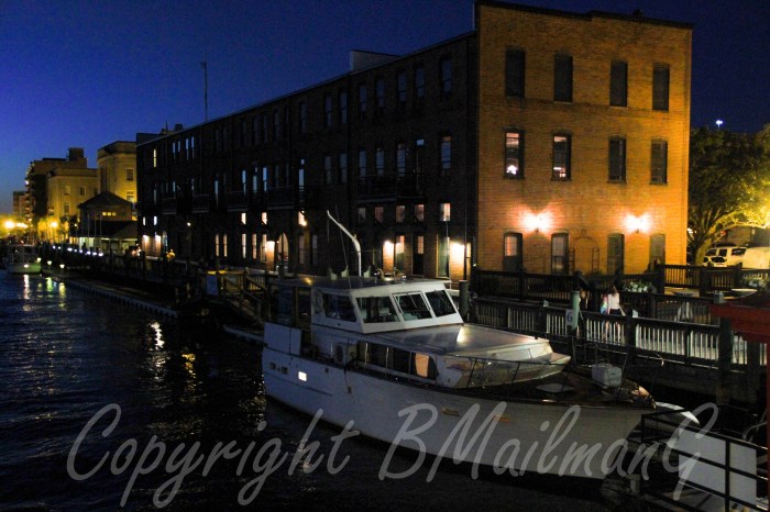 Boat tied up to the dock on the Cape Fear River in Wilmington, North Carolina.