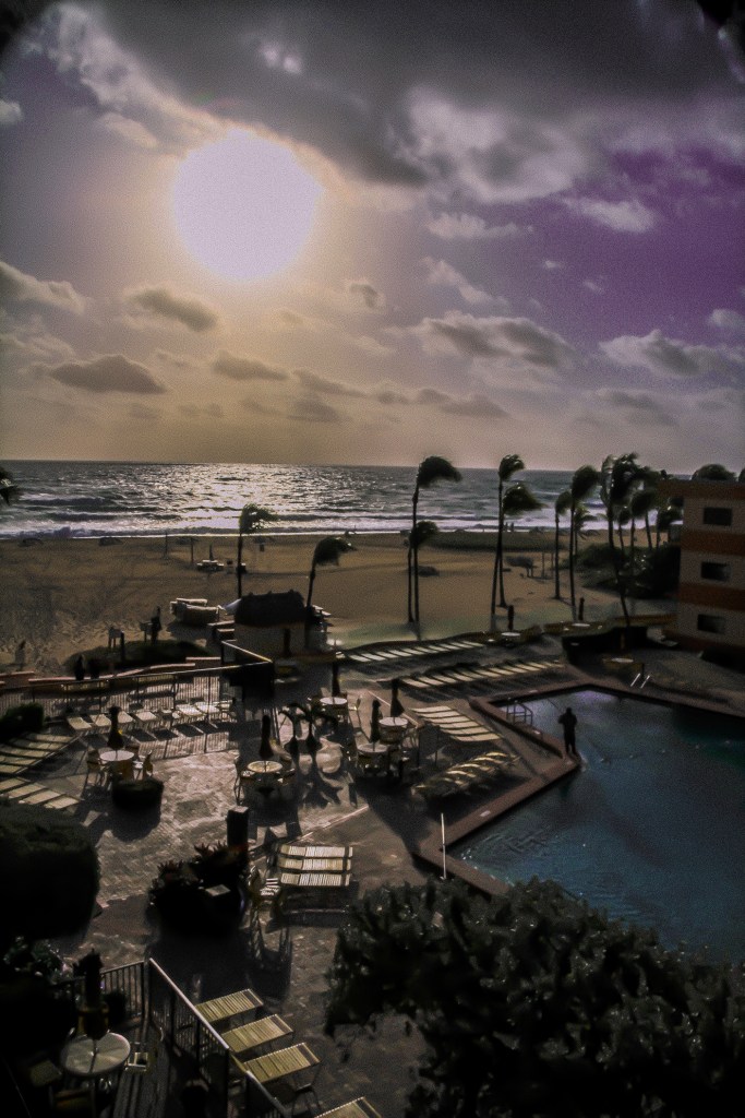 An early morning shot of our diligent pool man out there before the guests working to keep his pool clean!  Every night the elements toss sand, sand and more sand into his pool and everyday he is there cleaning the pool!  Thank You Pool Man, Thank You.